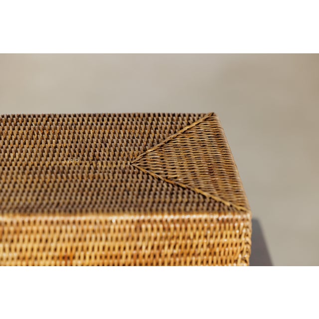 "About the Item A woven poem in rattan, this long rectangular lidded box captures the quiet elegance of natural fiber and...