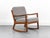 Rare Senator rocking chair in a beautiful design, crafted from solid teak, based on a design by Professor Ole Wanscher and...