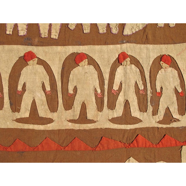 Very likely an North African textile tapestry with Geometric Design Rendered in tribal motifs, animals, people on horse...