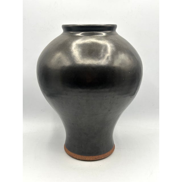 California modern studio pottery vase by Mark Blumenfeld of Laguna Beach, with a charcoal-black/gun metal glaze with...
