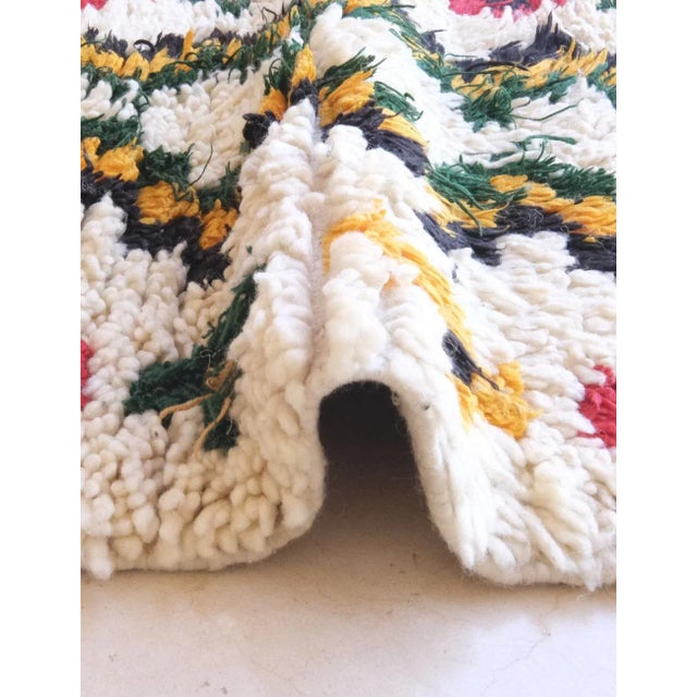 Add warmth, artistry, and cultural depth to your space with this Ourika Moroccan runner rug. Handwoven in the Ourika...