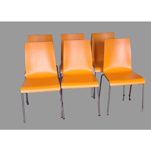 These vintage Mid-Century Modern armless chairs are a great addition to any dining room or any room in your home. The...