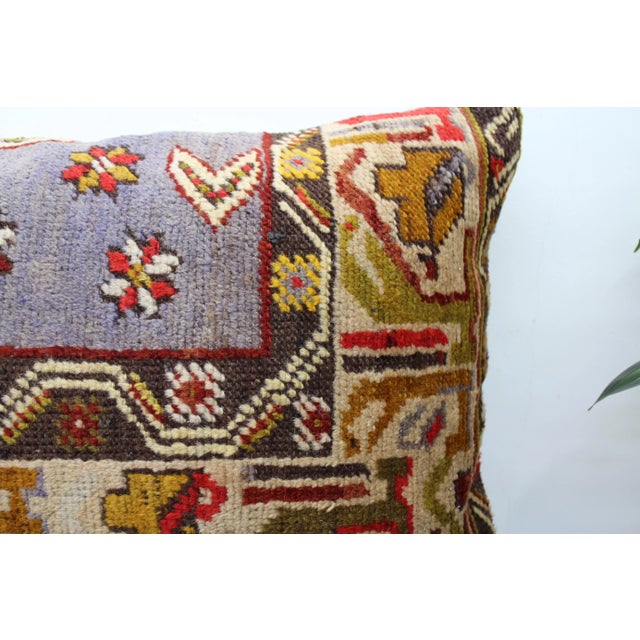 This Turkish pillow cover is made from the highest quality Vintage rug in 100% wool on the front. The back is covered in...