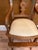 Antique Eastlake Victorian Style Carved Child’s High Chair with a built in foot rest, original seat was caned apparent by...