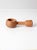 A beautifully sculptural vintage mid-century turned wood nutcracker with a warm natural finish and softly rounded form....