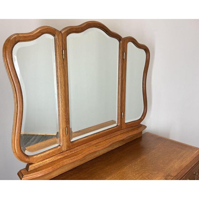 This elegant Vintage French Louis dressing table offers a classic and refined look, crafted in oak with beautifully shaped...