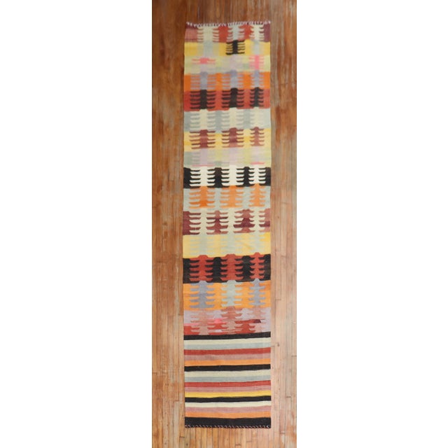 Long Turkish Kilim Runner from the middle of the 20th century Measures: 3' x 15'9".