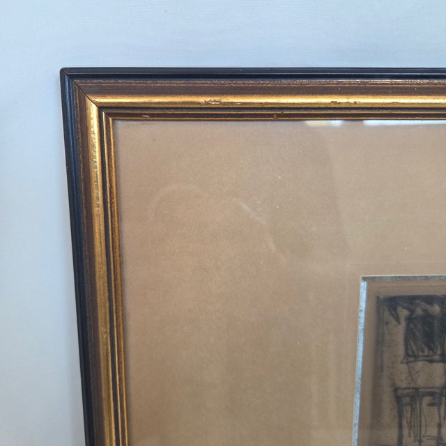 A beautifully framed antique color etching by French artist Armand Coussens (1881–1935) depicting a bustling European...