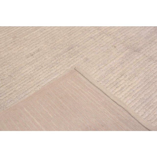 Elegant Solid Abstract Light Cream Color Modern Contemporary Area Rug, Country of origin: Central Asia, Circa date: Modern...