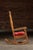 Antique Wooden Rocking Chair With Red Cushion For Sale - Image 4 of 10