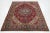 This Vintage Persian Handmade wool rug. This Tabriz rug with red and multicolor accents. This rug measures 6'8" x 9'9".