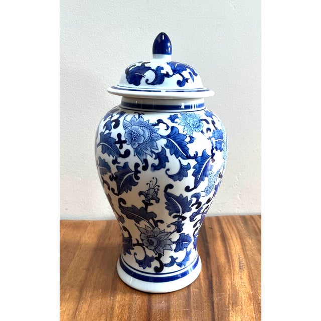 Classic Blue and white ceramic go her jar 15” x 8 x 8” Floral design Works with both modern and traditional decors 2 pcs...