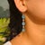 A Pair of Handcrafted Dangling Silver Earrings With Blue Topaz & Zirconia Gemstone For Sale - Image 6 of 12