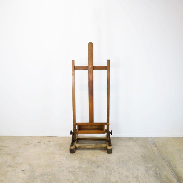 A Mexican wooden adjustable artist easel, circa 1950. This easel has the same design as those currently in the study of...