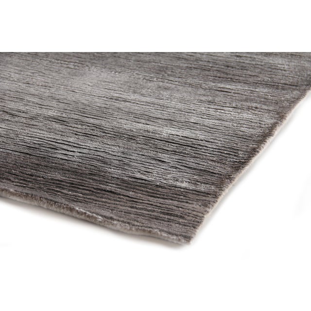 Keep it simple but sophisticated with the Maxwell Rug. Made from Bamboo silk, this beautiful rug offers a subtle sheen...