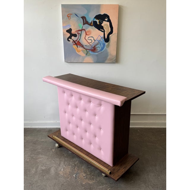 Sip in style with this dream mid-century modern setup, featuring a custom diamond-tufted bar in the perfect shade of...