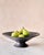The Large Handcrafted Ceramic Pedestal Bowl by NPage Studio X Lostine is a sculptural decorative vessel that blends...