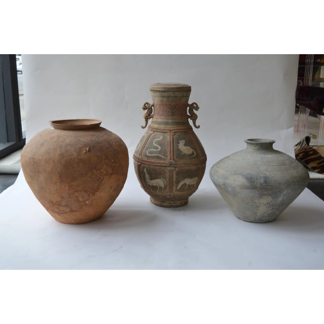 A variety of seven Zhou dynasty vases. Dated 500-300 B.C.