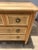 An elegant 19th-century French Louis XVI commode crafted from solid walnut with a beautiful bleached finish that...