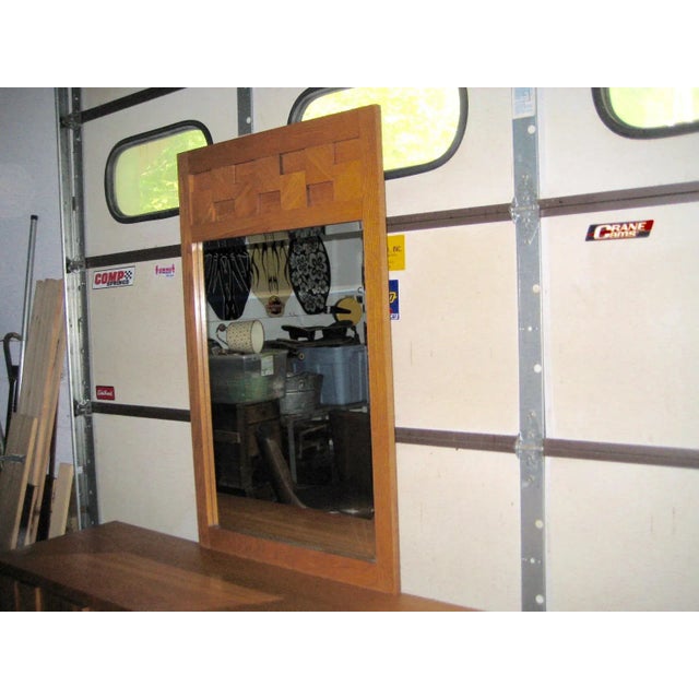 Midcentury Brutalist Mirror by Paul Evans and made by the Lane Company in the 1960s. This mirror is in excellent condition...