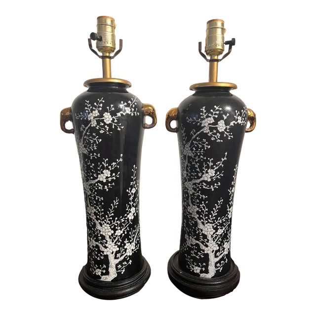 1970s Chinoiserie Black and White Cherry Blossom Tall Lamps With Gold Elephant Head Rings - A Pair For Sale