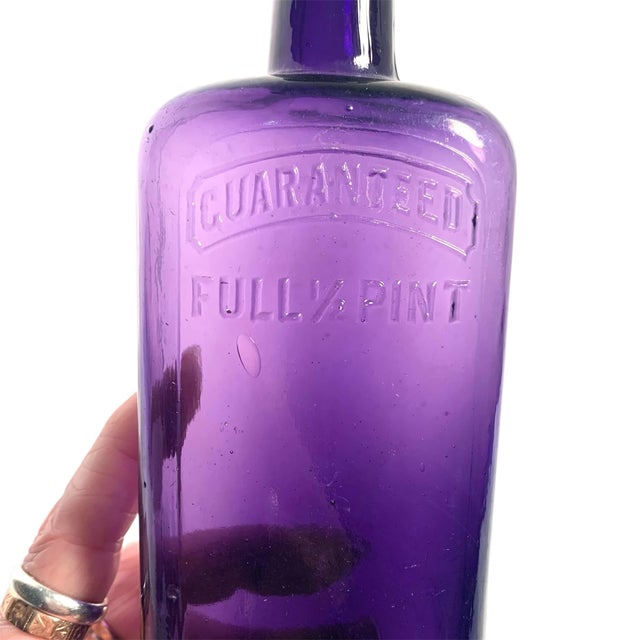 Early 20th C. Amethyst Embossed Half-Pint Whiskey Bottle For Sale - Image 12 of 12