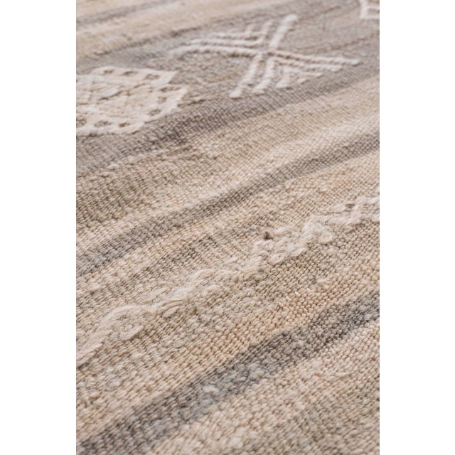 This vintage Turkish flat weave Kilim is hand-woven. The simplicity and boldness of this piece can also give a...