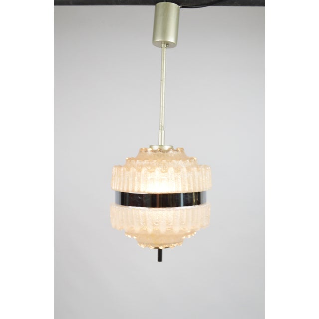 Glass Pendant Lamp, 1970s, in Worn conditions. Designed 1970 to 1979 Up to 250V (Europe/UK Standard).The wiring of this...