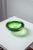 Elegant Murano glass trinket bowl with a beautiful gradient of green. Its round, organic shape and subtle color nuances...