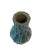 Small blue vase with 3D pattern. DIMENSIONS: Height- 9" Width at bottom- 2.25" Width in middle- 4" Width at top/ opening- 2"