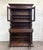 This is an impressive antique late 19th-century French Renaissance Revival walnut step-back bookcase cabinet, circa 1880....