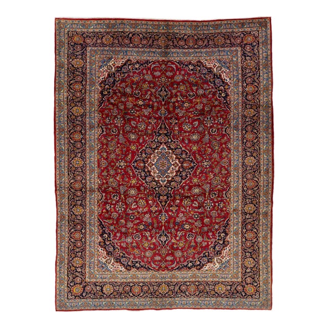 Vintage Red Kashan Persian Wool Rug Featuring a Medallion Design For Sale