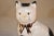 Circa 1970 vintage figure of a cat from the Staffordshire region of England. The cat is decorated in black and white, and...