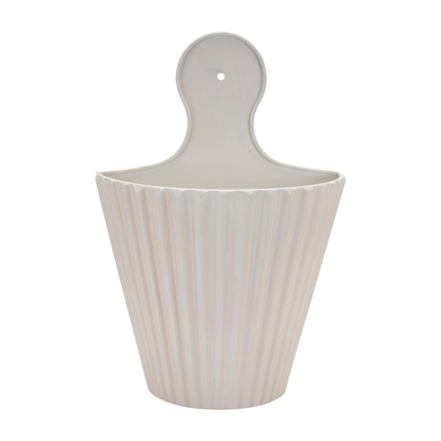 Elevate your home with the timeless charm of this Set of Ribbed Metal Wall Pockets. Crafted from durable metal in a clean...