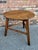 This 18th Century English oak cricket table is wonderfully patinated and showcases the lovely grain found within the round...