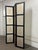 Design Plus Gallery presents a Shell Three Panel Folding Screen from Shawna Stoney. The black wood frame is divided into...