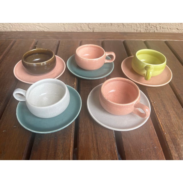 These mid-century modern pieces are Russel Wright "American Modern" demitasse / espresso cups and saucers, originally...