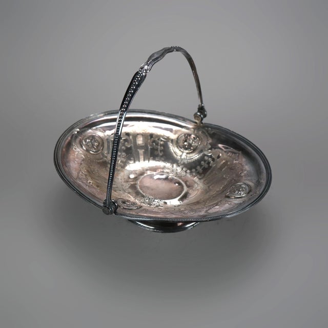 Antique Figural Silver Plated Fruit Bowl with Mask and Foliate Engraving C1890 Measures - 9"H x 11.5"W x 9.75"D