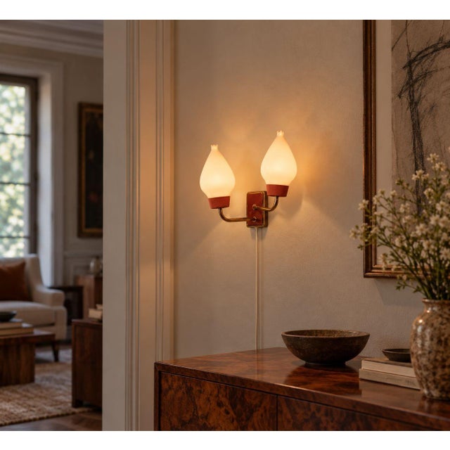 Swedish Mid-Century Modern, Double Wall Light or Sconce, Brass, Lacquered Metal, Opaline Glass, Sweden, 1940s A sculptural...