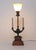 Vintage Neoclassical-style brass bouillotte-style table lamp, featuring a central upward-facing light with a frosted glass...
