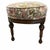Antique upholstered long bench or ottoman in tapestry floral print sitting on a dark brown frame. Colors include pink,...