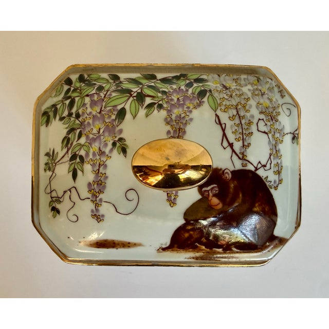 Here is a charming antique Japanese lidded porcelain box dating to the late Meiji–Taishō period (circa 1890–1920). The box...