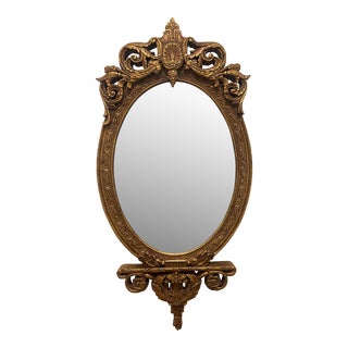 Late 20th Century Hollywood Regency Ornate Oval Gold Mirror For Sale
