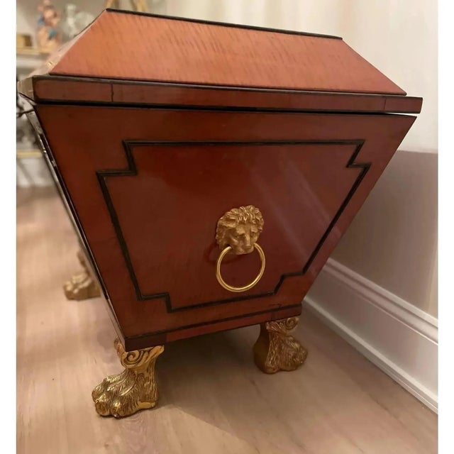 Offered is a rare antique 1820s Satinwood bar wine cabinet Cellarette. This piece features beautiful wood grain and black...