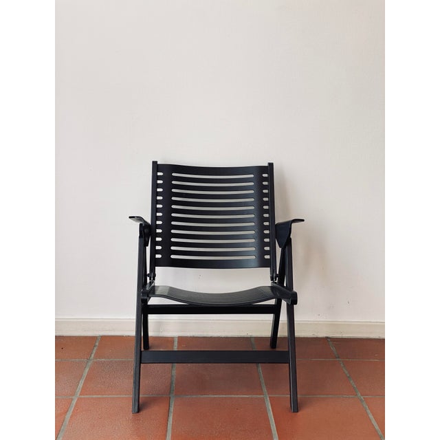 Iconic Rex Lounge Chair by Niko Kralj. The folding chair is an made of beech plywood and metal, designed in the late...
