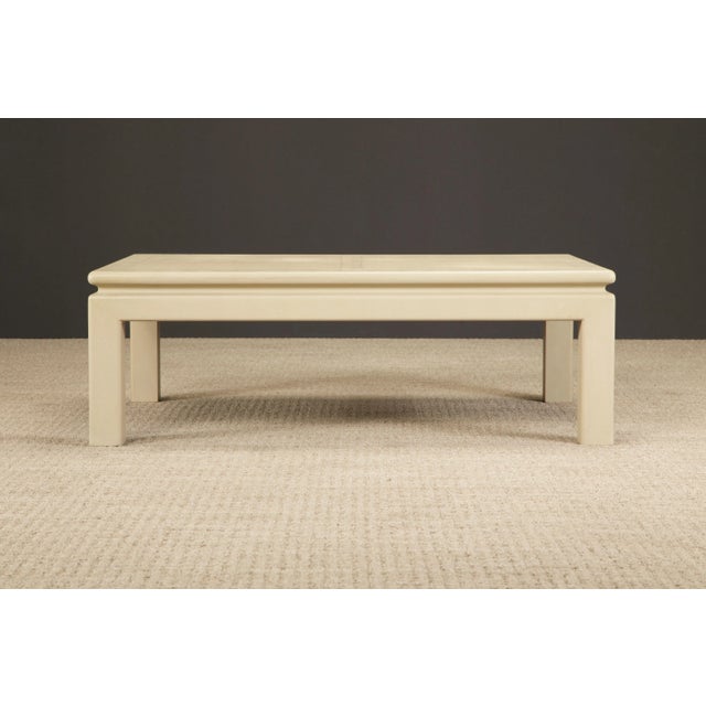 This gorgeous Karl Springer (signed) reptile embossed leather coffee table is signed and dated 1983, the same year that...