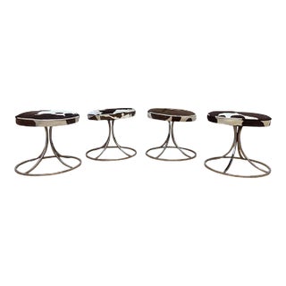Mid Century Modern Chrome Swivel Stools Newly Reupholstered in Cowhide - Set of 4 For Sale