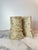Striking pair of Postmodern fossil stone column bookends, showcasing the raw beauty and natural variation of sedimentary...