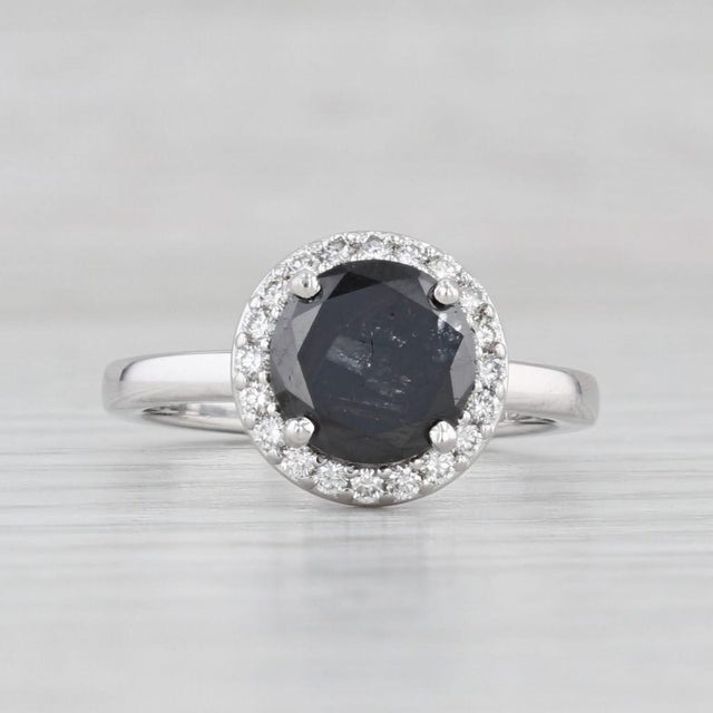 Gemstone Information: - Natural Diamond - Carats - 1.52ct (8.1 mm) Cut - Round Brilliant Color - Treated Black Please note...