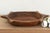 The sculptural form of this vintage bowl takes center stage. Carved from a single piece of solid hardwood, it features a...